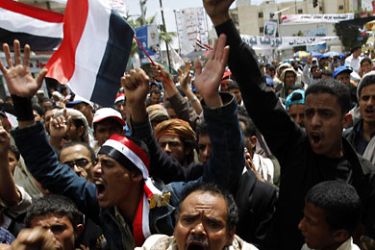 Anti-government protesters shout slogans during a rally to demand the ouster of Yemen's President Ali Abdullah Saleh outside Sanaa University March 6, 2011. Yemeni government loyalists attacked an anti-government protest camp south of Sanaa on Sunday in an attempt to break up their demonstration,