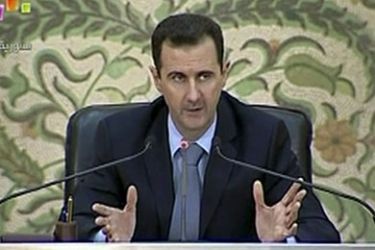 r_Syria's President Bashar al-Assad delivers a speech to a new cabinet he named last week during a broadcast by Syrian state television in Damascus, in this file picture