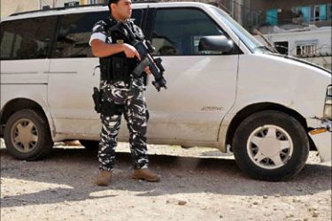 f_A handout picture released by Lebanon's Internal Security Forces (ISF) on March 30, 2011 shows an ISF member standing next to a van believed to have been used in the kidnapping of seven Estonian cyclists in Lebanon's eastern Bekaa Valley a week ago