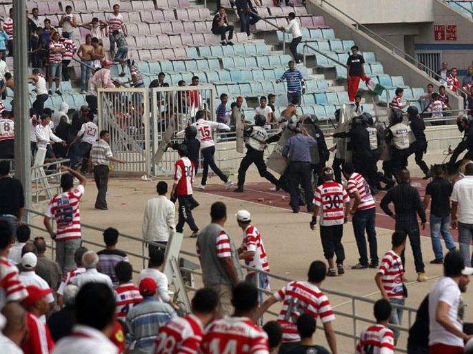 Tunis Club Africain's supporters invade the pitch during the African league football match between Tunis club Africain and Sudan El Hillal on May 7, 2011 in Rades Olympic stadium, near Tunis.