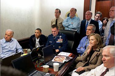 In this photo released by the White House, President Obama and members of the national security team receive an update on the mission against Osama bin Laden in the Situation Room Sunday. (Pete Souza, White House)
