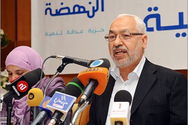 Cofounder of the Islamist movement "Ennahada" or "En-Nahdha", Rached Ghannouchi, speaks during a meeting on June 6, 2011 in Tunis on the occasion of the 30th anniversary of its movement. "We do not exclude the existence of a conspiracy