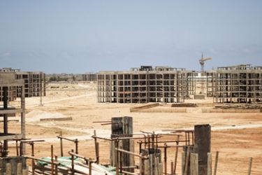 A picture shows the abandoned construction site of the "New Benghazi" project in the Libyan rebel stronghold of Benghazi on June 14, 2011. Hundreds of cement mixers, cranes, and forklifts stand silent on a massive construction site among grey buildings left unfinished when Chinese workers abandoned Libya as fighting flared.