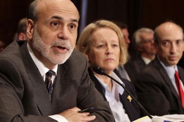 r_U.S. Federal Reserve Chairman Ben Bernanke (L) testifies alongside Mary Schapiro, chairman of the Securities and Exchange Commission; and Gary Gensler (R), chairman of the Commodity Futures Trading Commission; before the Senate Banking, Housing and Urban Affairs Committee hearing on Enhanced Oversight After the Financial Crisis: The Wall Street Reform Act at One Year on Capitol Hill in Washington, July 21