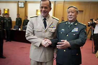 r_U.S. Admiral Mike Mullen (L), chairman of the Joint Chiefs of Staff, shakes hands with General Chen Bingde, chief of the General Staff of the Chinese People's Liberation Army, before their meeting at the Bayi Building in Beijing July 11