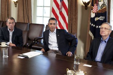 R_U.S. President Barack Obama (C) sit with House Speaker John Boehner (R-OH) (L) and Senate Majority Leader Harry Reid (D-NV) during a meeting about the debt limit at the White House in Washington July 23, 2011