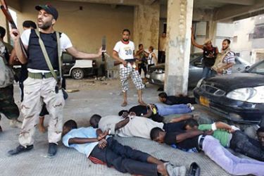R_The Libyan rebels have been meting out brutal treatment to sub-Saharan Africans in Tripoli, suspecting that they are Gaddafi loyalistsThe Libyan rebels have been meting out brutal treatment to sub-Saharan Africans in Tripoli, suspecting that they are Gaddafi loyalists