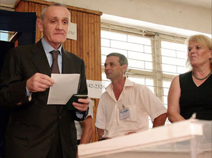 F_Abkhazia's vice-president and presidendial candidate Alexander Ankvab casts his ballot on August 26, 2011 in Sukhumi as voters in rebel Abkhazia went to the polls to elect a third leader