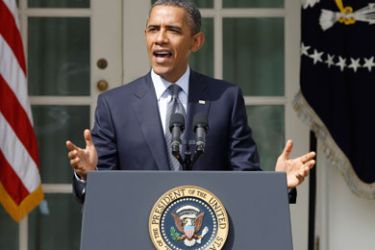 U.S. President Barack Obama gestures as he talks about cutting the U.S. deficit by raising taxes from the Rose Garden of the White House in Washington, September 19, 2011.