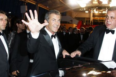 epa02738645 US actor Mel Gibson leaves the screening of 'The Beaver' during the 64th Cannes Film Festival in Cannes, France, 17 May 2011. The movie by US actress and director Jodie Foster is presented out of competition at the film festival, running from 11 to 22 May. EPA/GUILLAUME HORCAJUELO