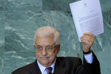 Mahmoud Abbas, President of the Palestinian Authority, holds a copy of the letter requesting Palestinian statehood as he speaks during the United Nations General Assembly September 23, 2011 at UN headquarters in New York.