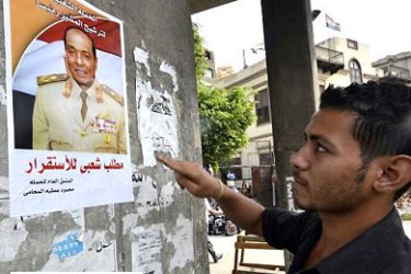 the times_Campaign posters proposing Egypt’s highest military the officerfor the presidency have renewed fears that the army