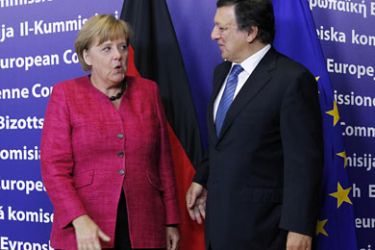 r_German Chancellor Angela Merkel (L) poses with European Commission President Jose Manuel Barroso ahead of a meeting at the European Commission headquarters