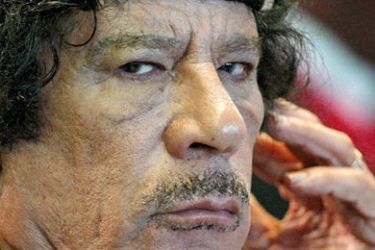 (FILES) A picture taken on November 16, 2009 shows Libyan leader Moamer Kadhafi attending a summit in Rome.Libyan TV quoted a National Transitional Council (NTC) commander as saying Kadhafi was captured in his hometown Sirte on October 20 , 2011. AFP PHOTO / POOL / ALESSANDRO DI MEO