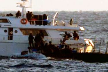An image released by the Israel Defence Forces (IDF) shows Israeli soldiers boarding one of the two Gaza-bound boats carrying pro-Palestinian activists in the Mediterranean Sea November 4, 2011.