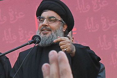 Lebanon's Hezbollah chief Hassan Nasrallah makes his first public appearance since 2008 before a frenzied crowd in the southern suburbs of Beirut on December 6, 2011