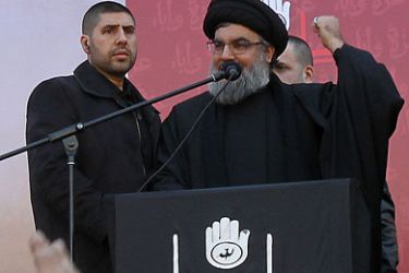 Lebanon's Hezbollah chief Hassan Nasrallah makes his first public appearance since 2008 before a frenzied crowd in the southern suburbs of Beirut on December 6, 2011.