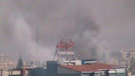 Smoke rises from the city of Homs December 4, 2011. Picture taken December 4, 2011.