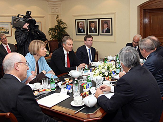 epa03048485 A handout picture made available by the Jordanian official news agency shows representatives of the Middle East peace Quartet including Quartet Middle East envoy Tony Blair (4-L), David Hill (C), the senior U.S. envoy to the peace process in the Middle, Palestinian chief negotiator Saeb Erekat (4-R), meeting with the Quartet envoys and Palestinian and Israeli negotiators, in Amman, Jordan 03 January 2012.