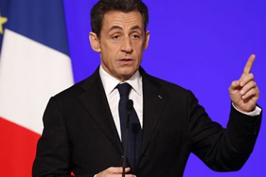 epa03051459 France's President Nicolas Sarkozy delivers a speech at the end of the 4th annual New World conference in Paris, France, 06 January 2012. EPA/GONZALO FUENTES/POOL MAXPPP OUT