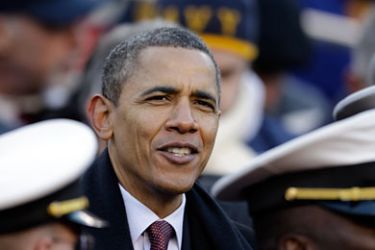 LANDOVER, MD - DECEMBER 10: US President Barack Obama sits with Navy Midshipmen while watching the112th annual Army-Navy Game at FedEx Field on December 10, 2011 in Landover, Maryland. (Photo by Rob Carr/Getty Images)