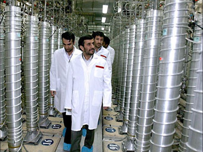 epa03054166 (FILE) A handout picture released by the presidential official website shows Iranian President Mahmoud Ahmadinejad inspecting the Natanz nuclear plant in central Iran, 08 March 2007. Reports on 09 January 2012 state that diplomats confirmed reports that Iran has allegedly started uranium enrichment at an underground bunker. EPA/IRAN'S PRESIDENCY OFFICE/HANDO HANDOUT EDITORIAL USE ONLY/NO SALES *** Local Caption *** 00000402130315