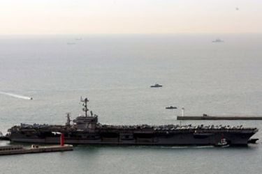 The nuclear-powered aircraft carrier USS John Stennis docks at Busan port on Korea's southeastern tip on 11 March 2009, joining in an ongoing U.S.-South Korean joint military exercise. EPA/STR /&lt;> . SOUTH KOREA OUT