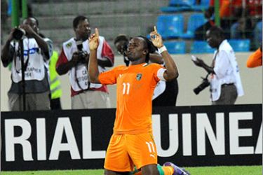 Ivory Coast Striker Didier Drogba celebrates after scoring a goal during the Africa Cup of Nations Quarter-final match between Ivory Coast and Equatorial Guinea in Malabo on Febuary 4, 2012, at the Malabo stadium . AFP PHOTO / ALEXANDER JOE