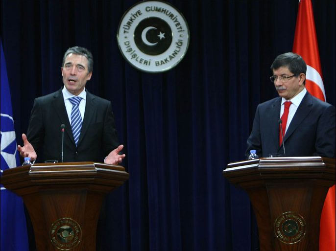 afp : Secretary General of NATO Anders Fogh Rasmussen,(L), and Turkey's Foreign Minister Ahmet Davutoglu speak during a joint press conference in Ankara on February 17, 2012. Rasmussen began a two-day visit to Turkey late on Thursday to mark the 60th anniversary of Ankara's membership in the 28-member alliance, reported the Anatolia news agency. AFP PHOTO/ADEM ALTAN