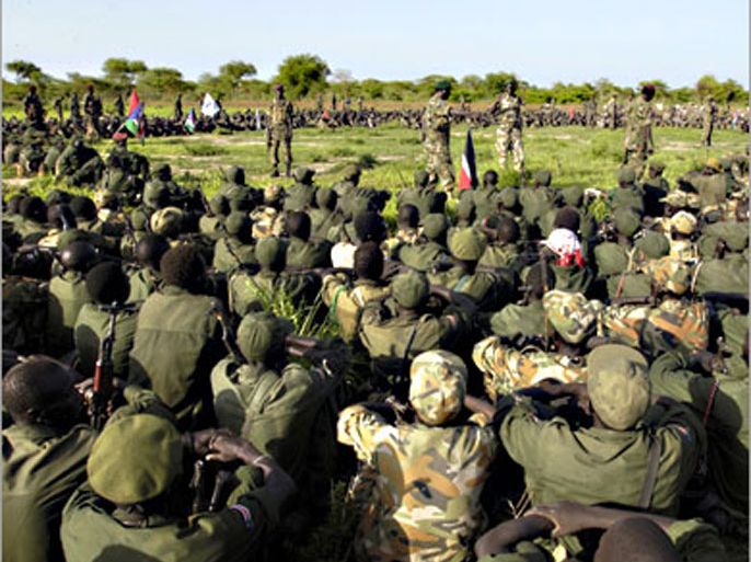 Sudan People's Liberation Army (SPLA) soldiers gather prior to their withdrawal south and out of the Abyei Area, as per the road map to resolve the Abyei crisis, in this picture released by the United Nations Mission in Sudan (UNMIS) on July 4, 2008.