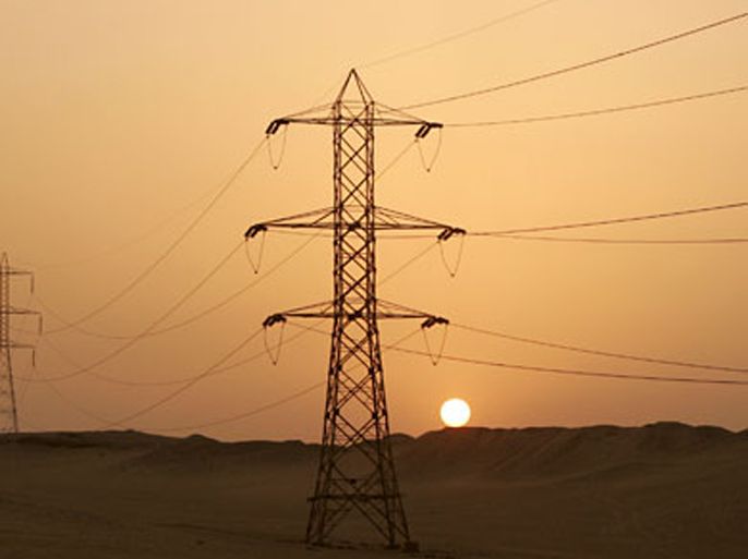 Electirical power lines cross the desert from a power plant south of Cairo as part of the Greater Cairo power grid near Saqqara, Egypt, 27 August 2008. 74 percent of Egypt's electricity comes from natural gas powered plants, 14 percent from petroleum and 12 percent from hydroelectric turbines of the Aswan high dam.