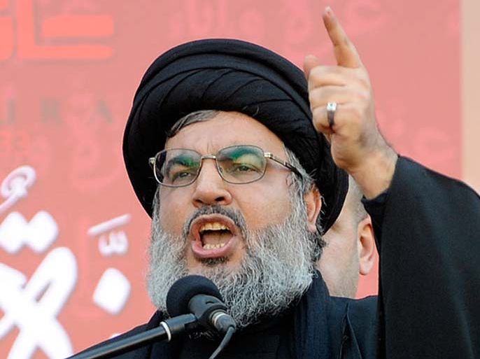 epa03025663 Hezbollah leader Hassan Nasrallah gestures as he speaks during his first public appearance since 2008, in Ashura day in southern Beirut, Lebanon, 06 December 2011. Shiite Muslims are observing the holy month of Muharram the climax of which is the Ashura festival commemorating the martyrdom
