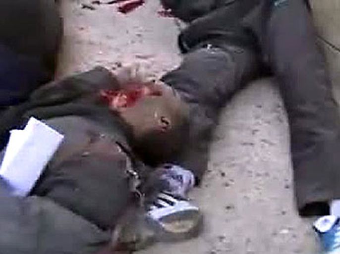 An image grab taken from a video uploaded on YouTube on February 6, 2012 shows dead Syrian men lying on the ground whom activists say were killed in early morning bombardment by regime forces in the flashpoint Syrian city of Homs. Syrian forces launched a fresh bombardment on the city of Homs at dawn, killing at least 12 people and wounding many more, activists and correspondents said. AFP PHOTO/YOUTUBE