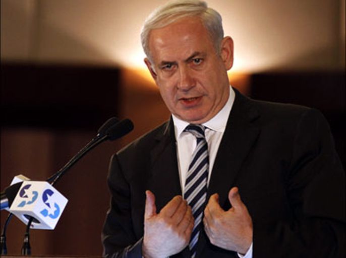 Israeli Prime Minister Benjamin Netanyahu gestures as he delivers a speech during the opening session of the Conference of Presidents of major Jewish American organizations on February 19, 2012 in Jerusalem.