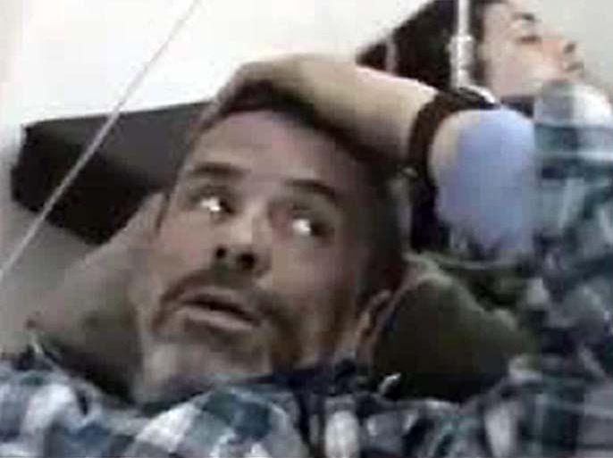 An image grab from a video uploaded on YouTube is said to show British photojournalist Paul Conroy lying on a hospital bed in the opposition city of Homs after he was injured in attacks by Syrian forces on the rebel hub's Bab Amr