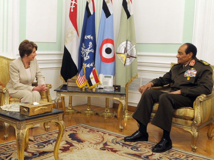 In a handout picture released by the US embassy in Cairo, Egypt's military ruler Hussein Tantawi meets with US congressional minority leader Nancy Pelosi in Cairo on March 15, 2012. Pelosi, a Democrat and former House speaker, is leading a delegation to Egypt after Cairo defused a crisis with Washington by allowing US democracy activists on trial to leave the country earlier this month. AFP PHOTO/HO -- RESTRICTED TO EDITORIAL USE - MANDATORY CREDIT "AFP PHOTO / US EMBASSY " - NO MARKETING NO ADVERTISING CAMPAIGNS - DISTRIBUTED AS A SERVICE TO CLIENTS