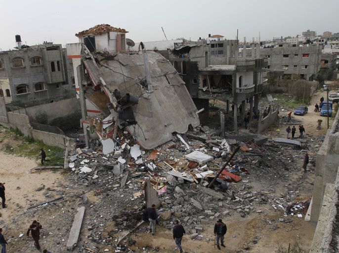 A general view shows the destruction after an Israeli air strike on a building in the northern Gaza Strip refugee camp of Jabalia on March 12, 2012