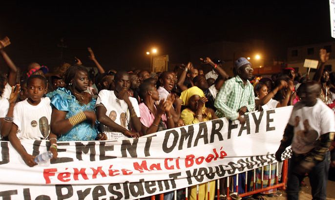 Supporters gather during a meeting on March 10, 2012 in Dakar ahead of the second round of the elections.