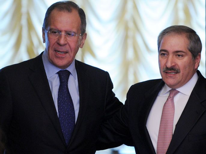 Russia's Foreign Minister Sergei Lavrov (L) speaks with his Jordan's counterpart Nasser Judeh (R) during their meeting in Moscow, on March 5, 2012