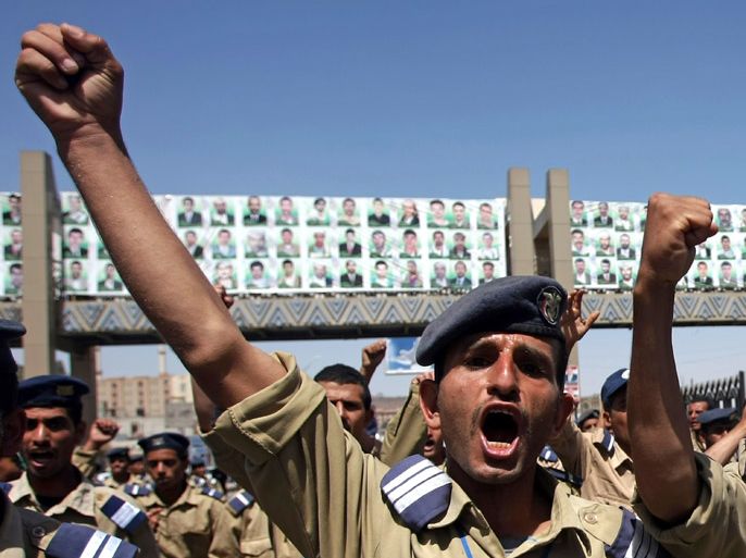 Yemeni air force soldiers chant slogans during a protest in the capital, Sanaa, on March 1, 2012, demanding the ouster of military chiefs over accusations of corruption. Demonstrators called for the sacking of air force commander