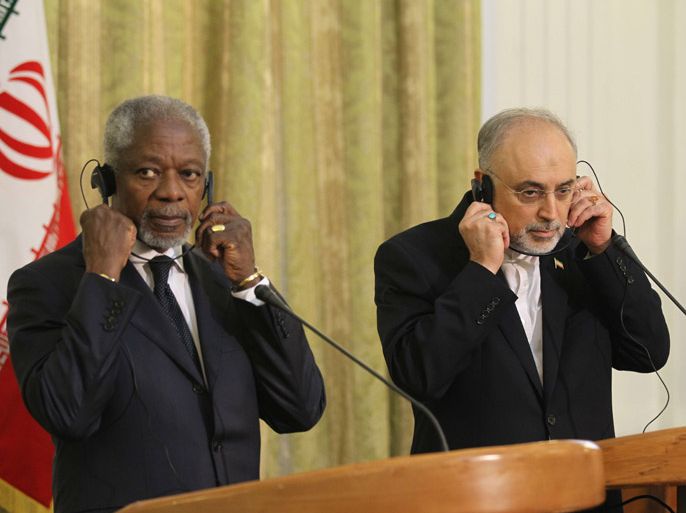 Tehran, -, IRAN : United Nations and Arab League envoy for the crisis in Syria, Kofi Annan (L) and Iranian Minister for Foreign Affairs Ali Akbar Salehi (R) listen through their headsets during a joint press conference in Tehran on April 11, 2012. Annan said the situation in Syria should be "much improved" by an April 13 deadline if both sides in the conflict respect a peace plan he drew up.