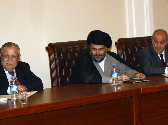 Iraqi President Jalal Talabani (L), Shiite cleric Moqtada al-Sadr (C) and former premier Iyad Allawi (R) attend a meeting of Iraqi leaders in Arbil, the capital of Kurdistan in northern Iraq, on April 28, 2012. Top Iraqi politicians, many of whom feel marginalised by Prime Minister Nuri al-Maliki's style of governing, called on Saturday in Arbil for greater democracy in running the country. AFP