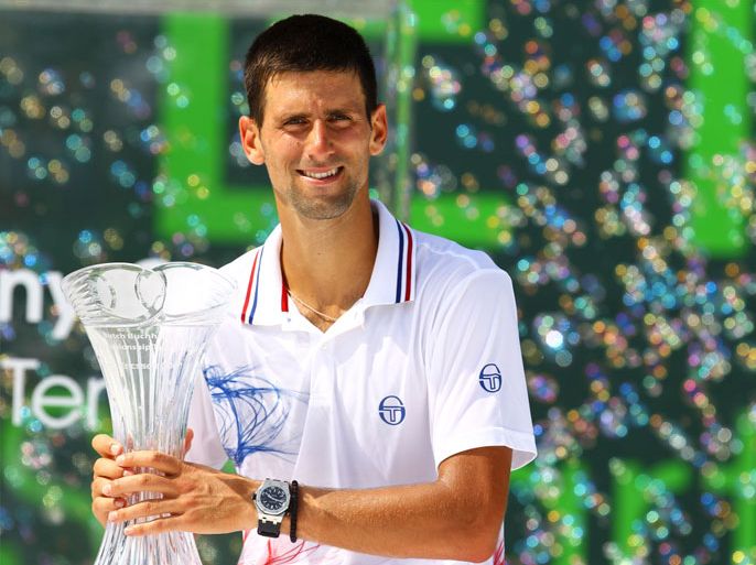 Novak Djokovic of Serbia holds the winners trophy after defeating Andy Murray of Great Britain during the Men's Finals on Day 14 at Crandon Park Tennis Center at the Sony Ericsson Open on April 1, 2012 in Key Biscayne, Florida.