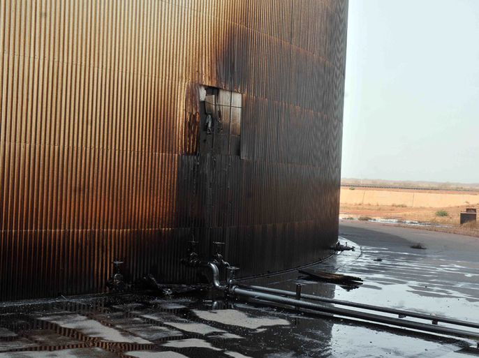 Oil leaks from a burnt processing facility in Sudan's main petroleum centre of Heglig bordering with South Sudan on April 24, 2012. South Sudan's leader accused Sudan of declaring war as Khartoum's warplanes bombed border regions in defiance of international calls for restraint. AFP