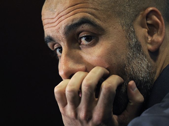 Barcelona's coach Josep Guardiola looks on during a press conference on April 17, 2012 at London's Stanford Bridge stadium on the eve of their UEFA Champions League semi-final first leg football match against Chelsea. AFP