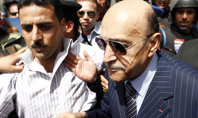 Egyptian intelligence chief Omar Suleiman enters the presidential election committee building in Cairo on April 7, 2012 to register his name for the upcoming presidential elections on May 23-24. Suleiman, a pillar of the ousted regime, decided to run for candidacy