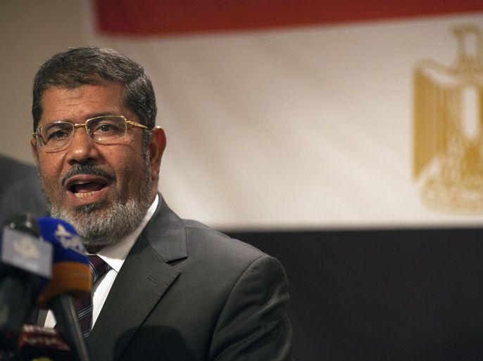 Muslim Brotherhood Egyptian presidential candidate Mohammed Mursi gives a press conference in Cairo on May 26, 2012.