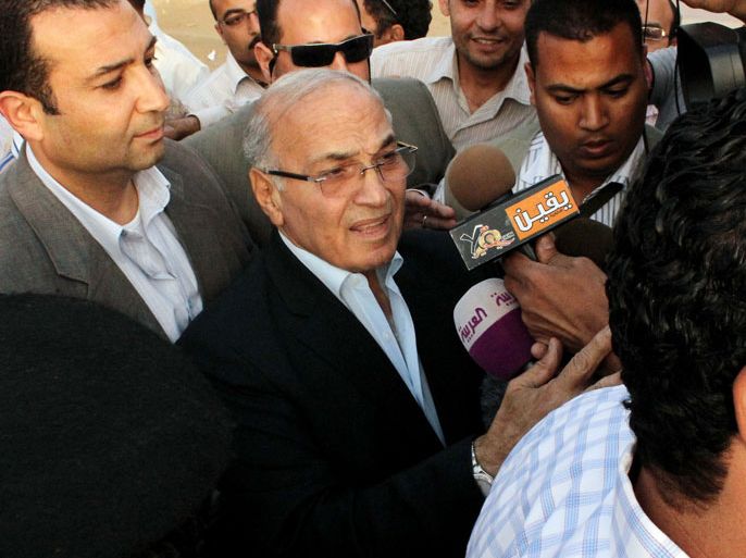 ptian presidential candidate and former prime minister Ahmed Shafiq arrives to vote at a polling station in Cairo on May 23, 2012. Egyptians voted in the country's first free presidential elections, with Islamists and secularists vying for power with competing visions of an Egypt liberated of ousted dictator Hosni Mubarak's iron grip. AFP