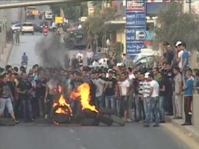 ‪الضاحية الجنوبية ببيروت شهدت مظاهرات بعد خطف لبنانيين بسوريا‬ (الجزيرة)