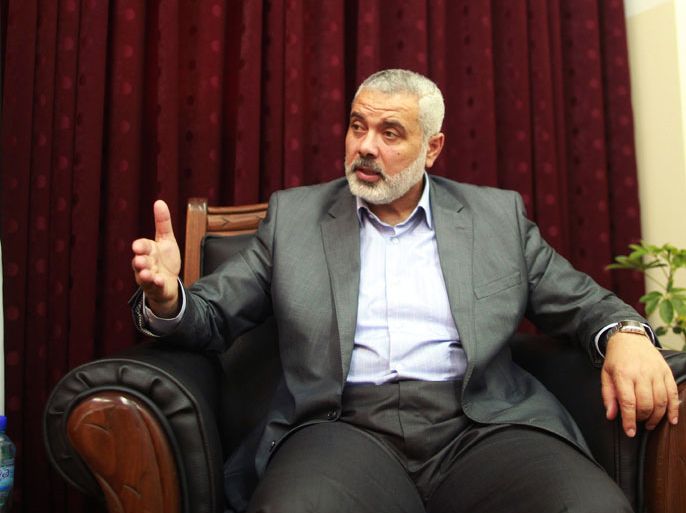 Senior Hamas leader Ismail Haniyeh gestures during an interview with Reuters in Gaza City May 10, 2012. The Islamist movement Hamas will not let itself be dragged into a war against Israel if Israel attacks the nuclear facilities of its ally Iran, Gaza leader Haniyeh said on Thursday. To match Interview PALESTINIANS-HAMAS/ REUTERS